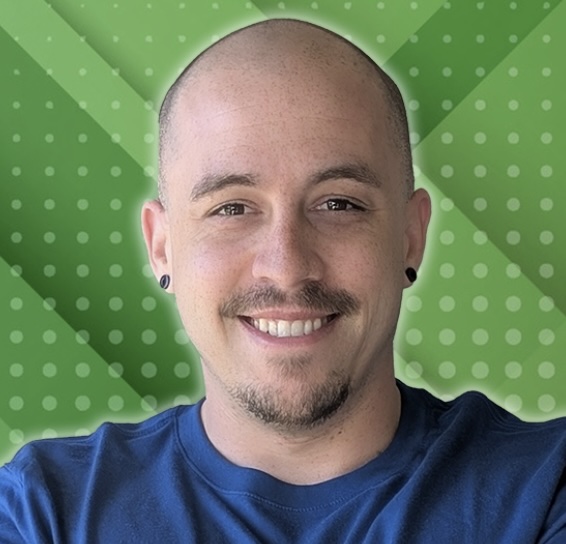 shawn smiling in front of an energetic green background